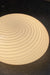 Ubrugt (ny) vintage Murano plafond lampe i glas med hvid swirl mønster. Kan både bruges som loftlampe eller som væglampe. 2x E27 fatning. Håndlavet i Italien, 1970erne, og kommer med ny hvid metal bagside.  D:36 cm H:15 cm
