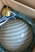 Italiensk Murano candy pendel loftlampe i grå brun glas med swirl mønster. Glasset er mundblæst hos en italiensk glaspuster familie, som arbejder i eget værksted. Udarbejdet efter traditionsrige Murano glaspuster teknikker. D:30 cm Størrelsen er perfekt over et spisebord eller midt i en stue.