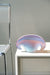 Vintage Murano muslingeskål i en smuk lilla nuance. Mundblæst i glas i form af en musling. Skålen har to baser og kan derfor både stå ret op eller hvile på siden. Håndlavet i Italien, 1960/70erne. 