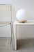 Vintage Murano bordlampe i hvid glas med swirl og messing bund. Lampen afgiver et meget hyggeligt lys og har en fantastisk swirl.