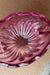 Vintage Murano muslingeskål, som er mundblæst i transparent pink glas. Muslingen har to baser og kan enten stå oprejst eller tippe på siden. Håndlavet i Italien 1960/70erne. L:19 cm H:11,5 cm 