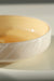 Vintage Murano skål med swirl mønster. Mundblæst creme/amber glas med hvid swirl. Håndlavet i Italien, 1970erne. ⁠⁠D:15,5 cm H:4 cm⁠⁠  ⁠⁠Item 456